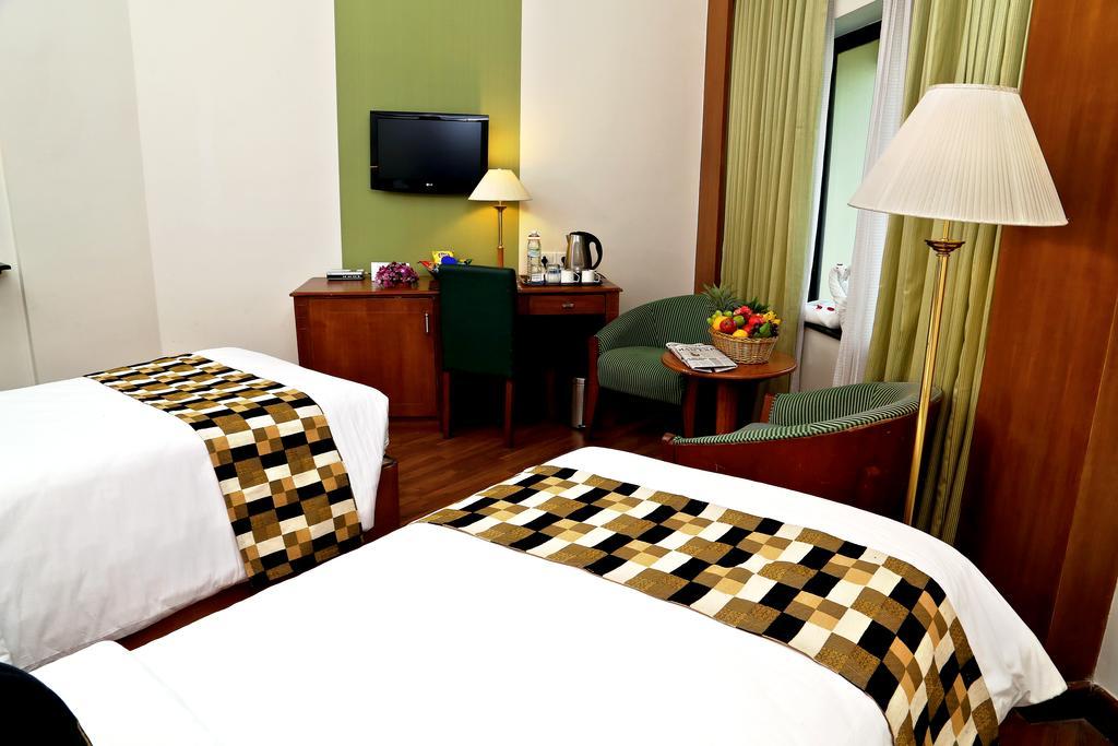 Hotel Gokulam Park à Kochi Chambre photo